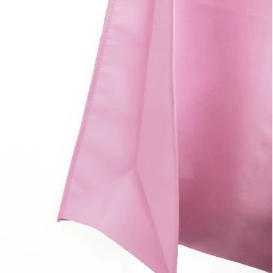 La ropa no tejida rosada caliente empaqueta el logotipo modificado para requisitos particulares de los bolsos de la cubierta del vestido de boda