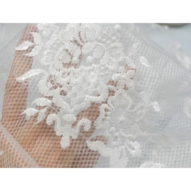 Vairumtirdzniecības viesību vakarkleitas kāzu kleitas audums ar 3D ziedu izšūtu tilla mežģīņu audumu