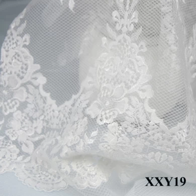Vairumtirdzniecības viesību vakarkleitas kāzu kleitas audums ar 3D ziedu izšūtu tilla mežģīņu audumu