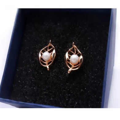High-Grade Pearl Ohrringe Hollow Blätter Female Fashion Gold Stud Ohrringe