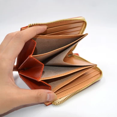 Woman in pelle arancione con portafoglio portafoglio portafoglio portafoglio per il portafoglio in pelle medio
