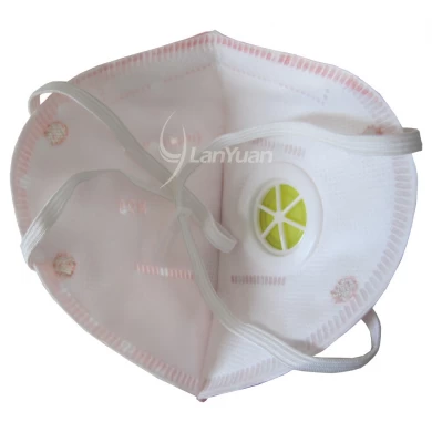 Peach Nonwoven Face Mask with White Dots Pattern and Valve