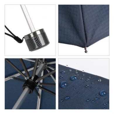 Günstigste ein Dollar 3-fach manuelle Regenschirm benutzerdefinierte Logo