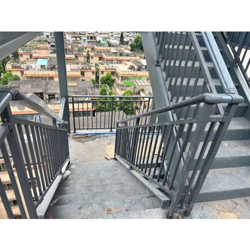 Matte black steel stair handrails