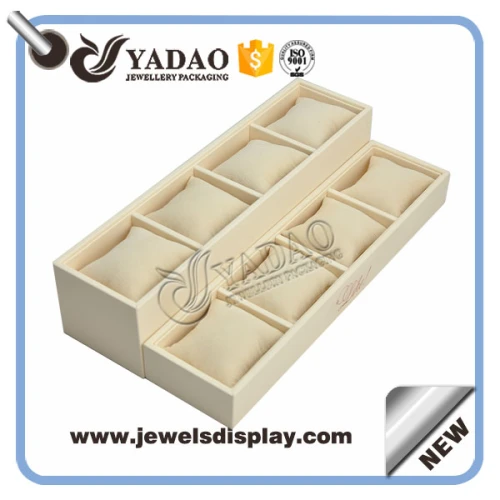 China Wholesale custom cream color PU leather jewelry and watch display trays with velvet pillow and custom gold hot stamping logo manufacturer
