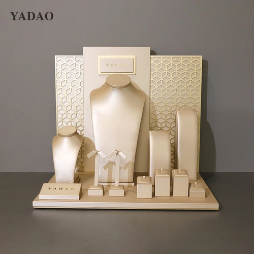 China Customized classic long lasting style shiny gold pu leather jewelry display set free logo plate besopke design finish manufacturer