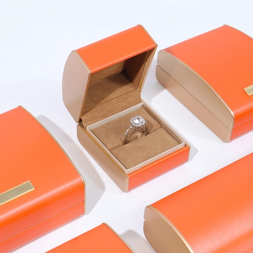 Großhandel orange Kunststoffbox Sturzdeckel PU-Leder Ringbox Schmuck Verpackung Box Aktien