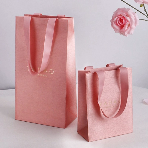 China customize fancy paper bag satin look jewelry bag paper gift packaging ribbon shopping bag manufacturer