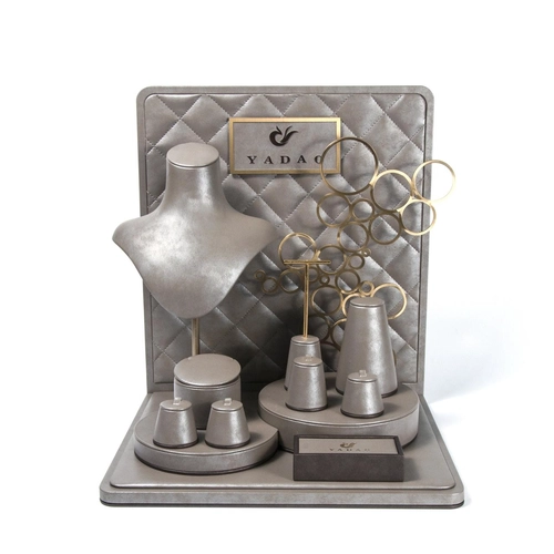 China Custom metal sticker logo wholesale handmade brown leatherette fine jewelry display sets,stand bust with metal decoreations manufacturer