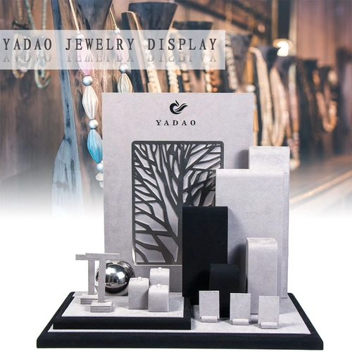 Soporte de exhibición de joyería de elementos de metal lujoso gris personalizado