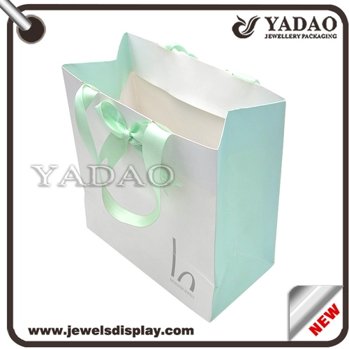 Customed logo printing fashion shopping bags for jewelry display and gift packing strong paper handbag