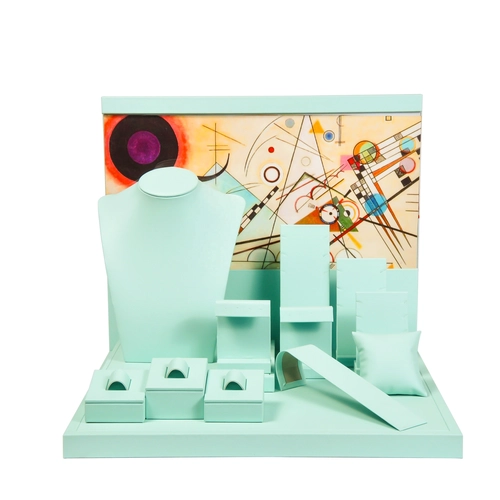 China Luxury Customized Green PU Leather Wooden Ring Chain Display Holder Jewelry Display Stand Sets For Store manufacturer