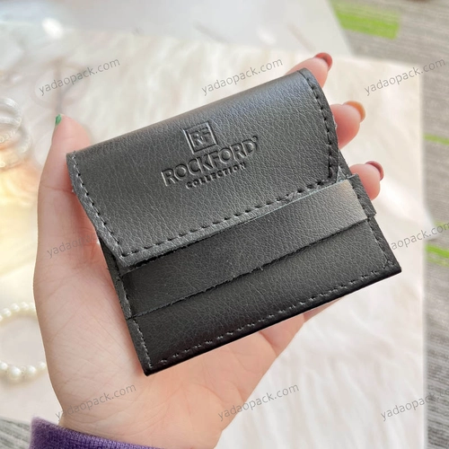 China flap pouch design pu leather pouch bag gift bag jewellery packaging bag stitching finish with belt closure manufacturer