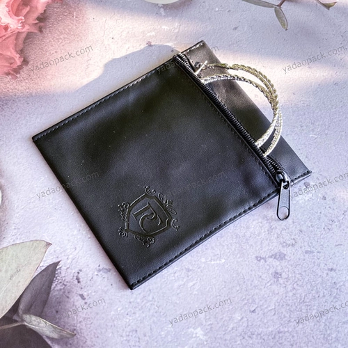 China high quality jewelry pouch bag pu leather bag zipper pouch bag jewelry packaging bag with debossed logo manufacturer