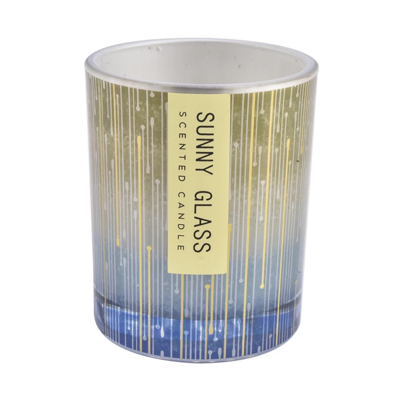 Luxuriöses, individuell gestaltetes Kerzenglas aus blauem und gelbem Glas mit vertikalen Streifen