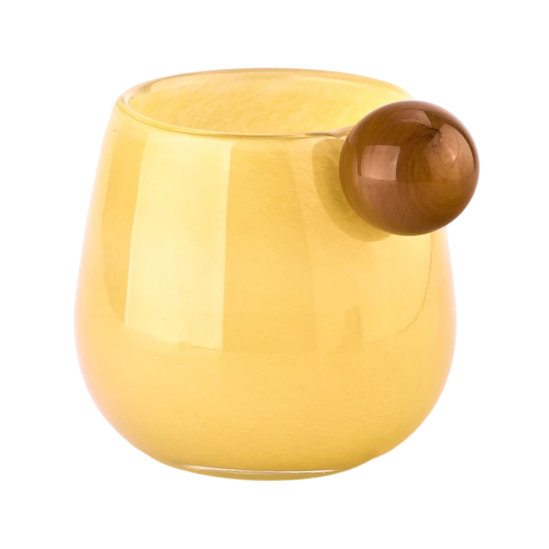 Candelero de cristal amarillo al por mayor con contenedores de velas con mango de bola