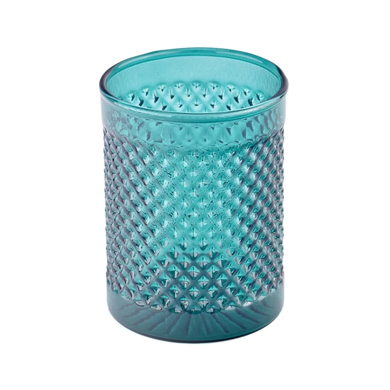 Modern custom recessed green glass candle jar with grain pattern