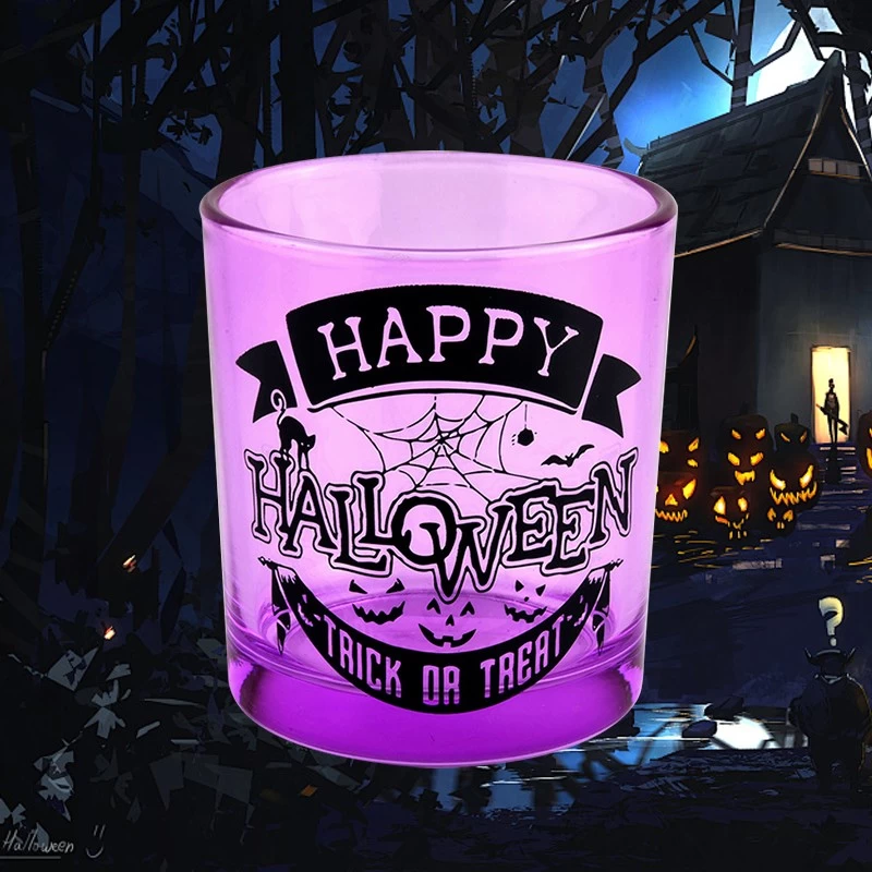 Halloween holiday decoration purple glass candle jar black lettering graffiti used for candle making