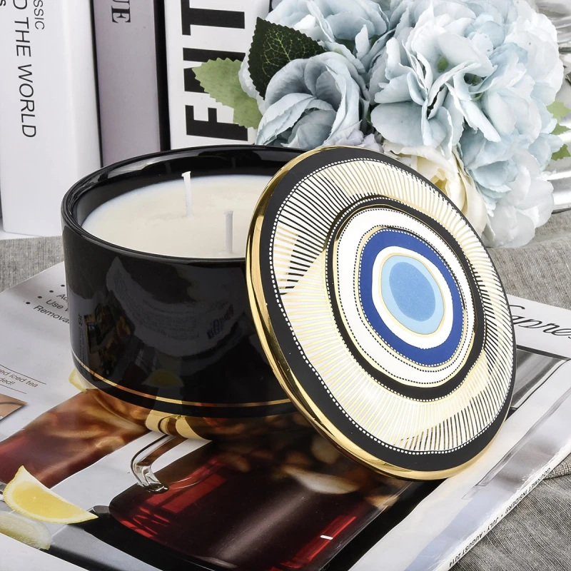 Unique design blue eye pattern ceramic candle jar with lid