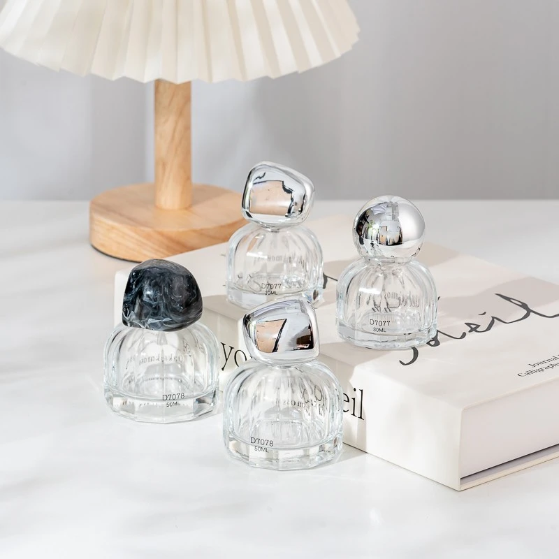 Round glass bottles for perfume