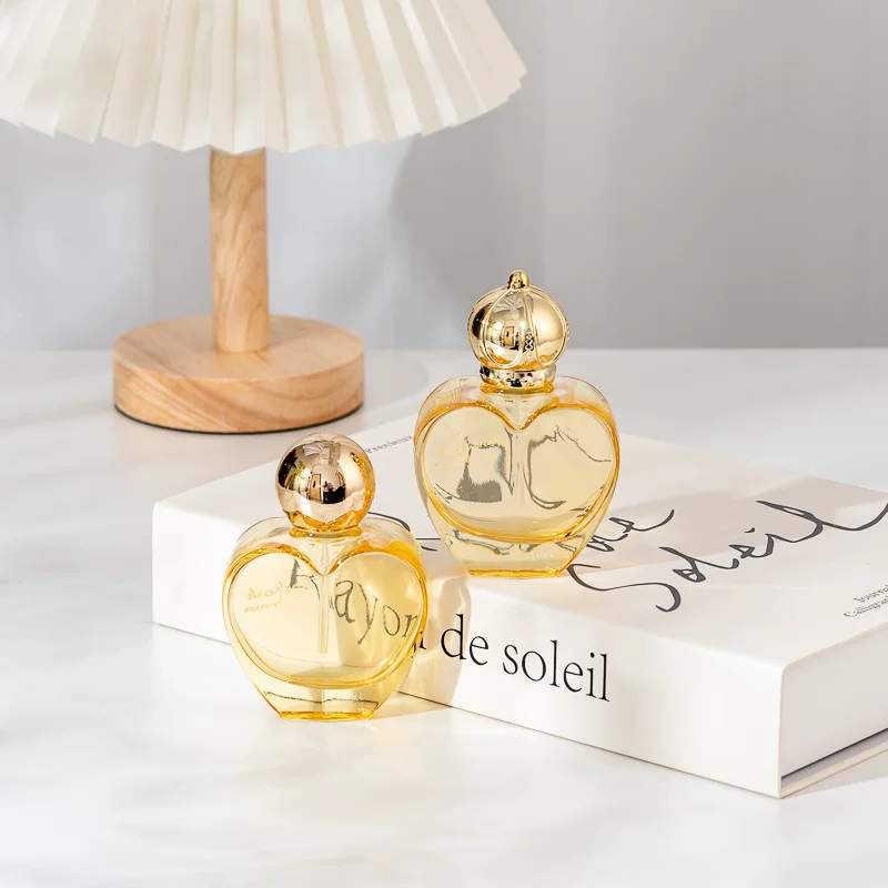 Amber glass perfume bottles with a heart shaped design
