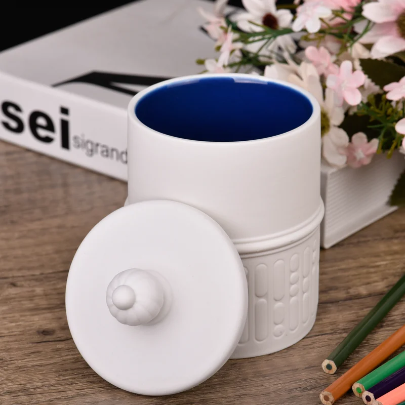 Wholesale plain white relief ceramic candle jars with lids for home storage containers