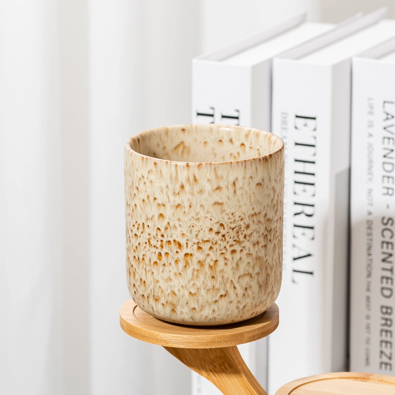 Pot de bougie en céramique de glaçure mouchetée de crème personnalisée en gros