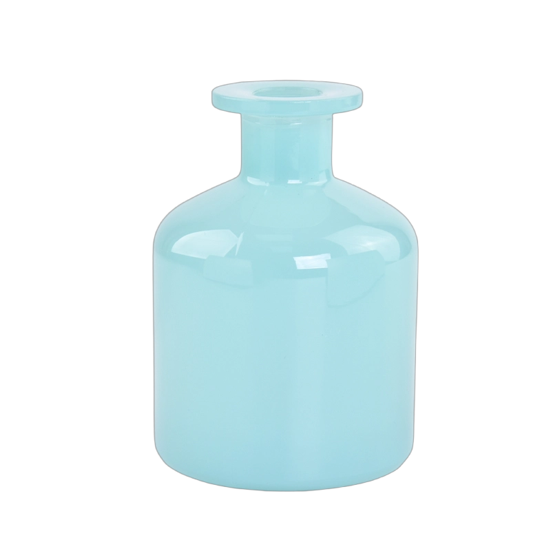 Maßgeschneiderte hellblaue zylindrische Glasduftflasche für luxuriöse Raumdüfte