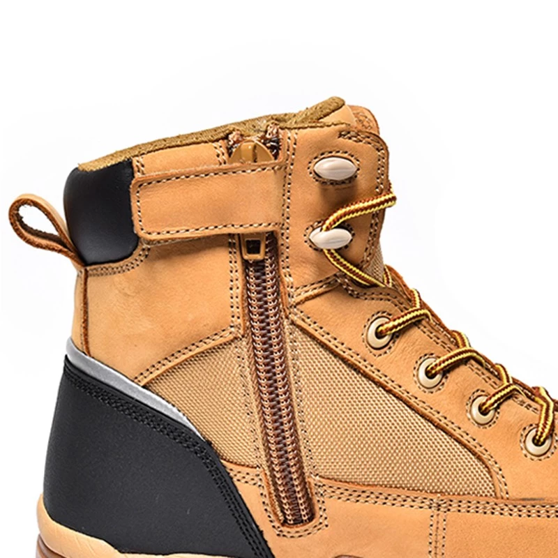 Китай TM173 Новые мужские защитные ботинки из нубука с противоскользящей подошвой из искусственной кожи и стальным носком на молнии производителя