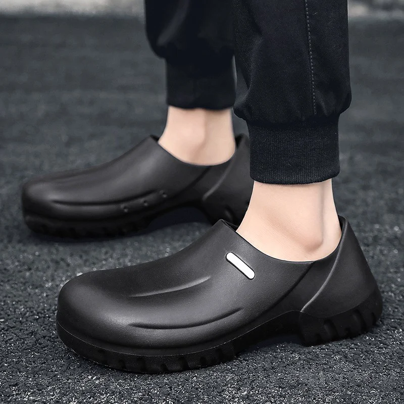 Chine Chaussures de sécurité pour chef de cuisine Eva imperméables noires antidérapantes TM3993 avec embout en acier fabricant