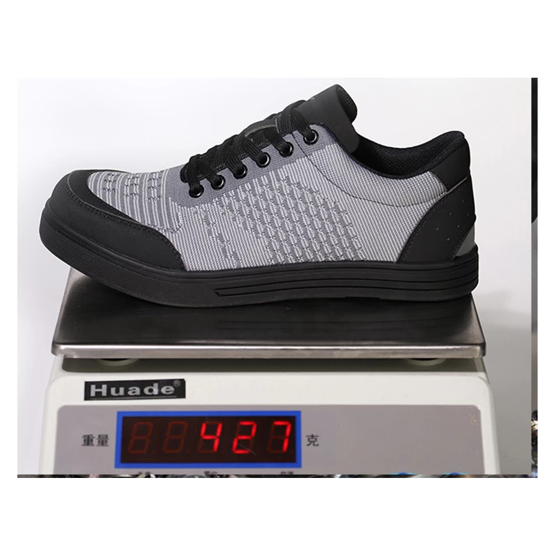 China 601 Anti slip oil resistant puncture proof breathable safety sport board shoes steel toe cap manufacturer