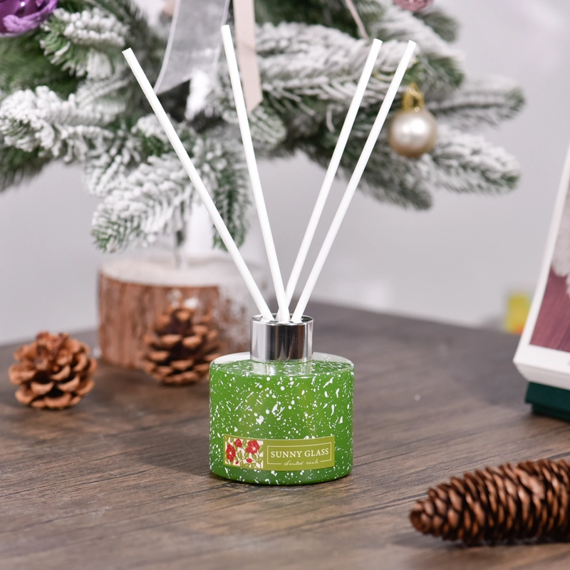 China Wholesale customized green christmas glass diffuser bottles for home gift manufacturer
