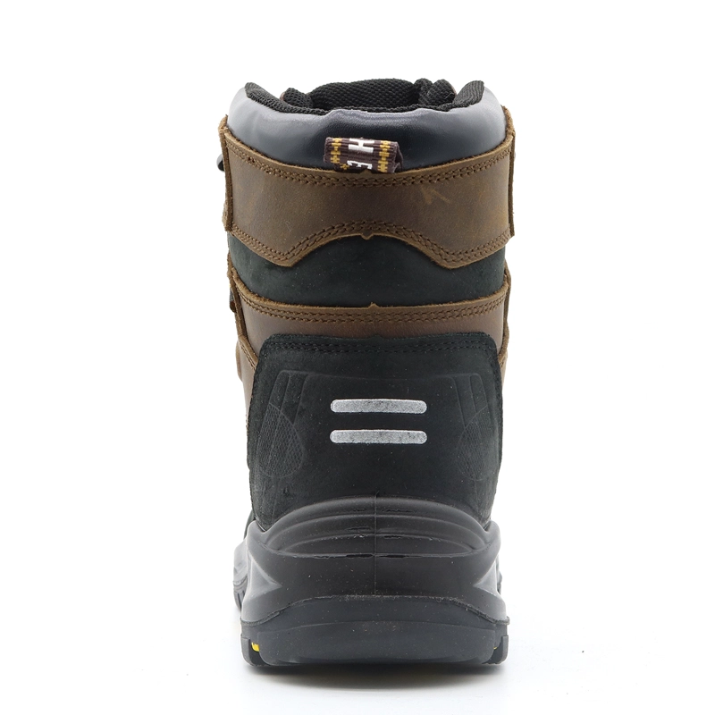 China TM134 Heat resistance rubber sole steel toe prevent puncture oil industry safety boots for men manufacturer