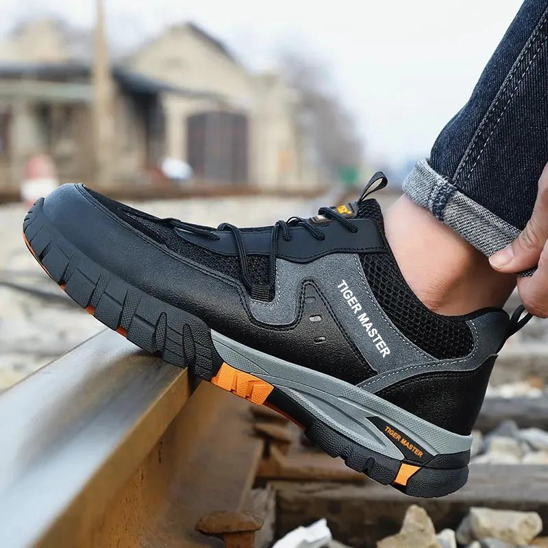 China TM3073 Wear resistant anti slip rubber sole anti puncture work safety shoes for men steel toe manufacturer