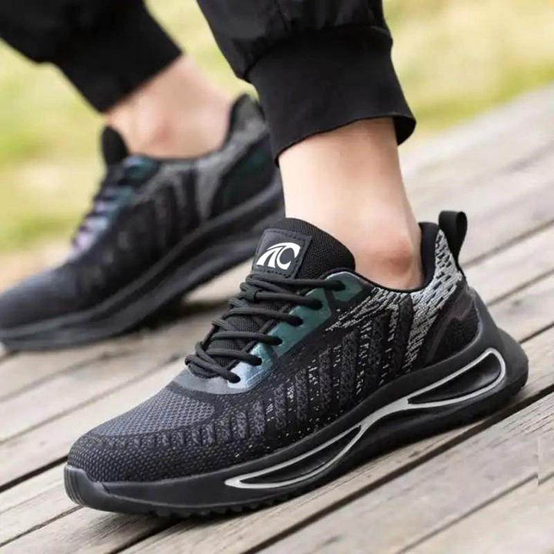 porcelana TM3140 Zapatos de seguridad de moda para hombre con punta de acero antideslizantes y a prueba de pinchazos deportivos fabricante