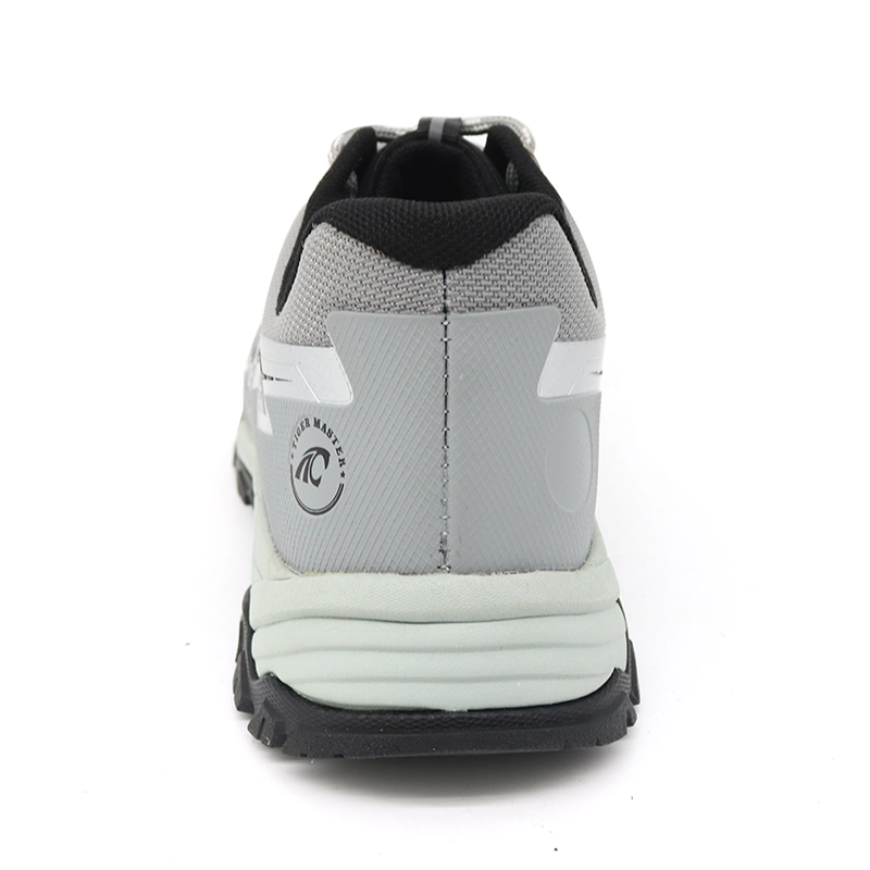 Chine TM2026-1 Chaussures de sécurité de randonnée de la mode antidérapante avec orteil en fibre de verre pour femmes fabricant