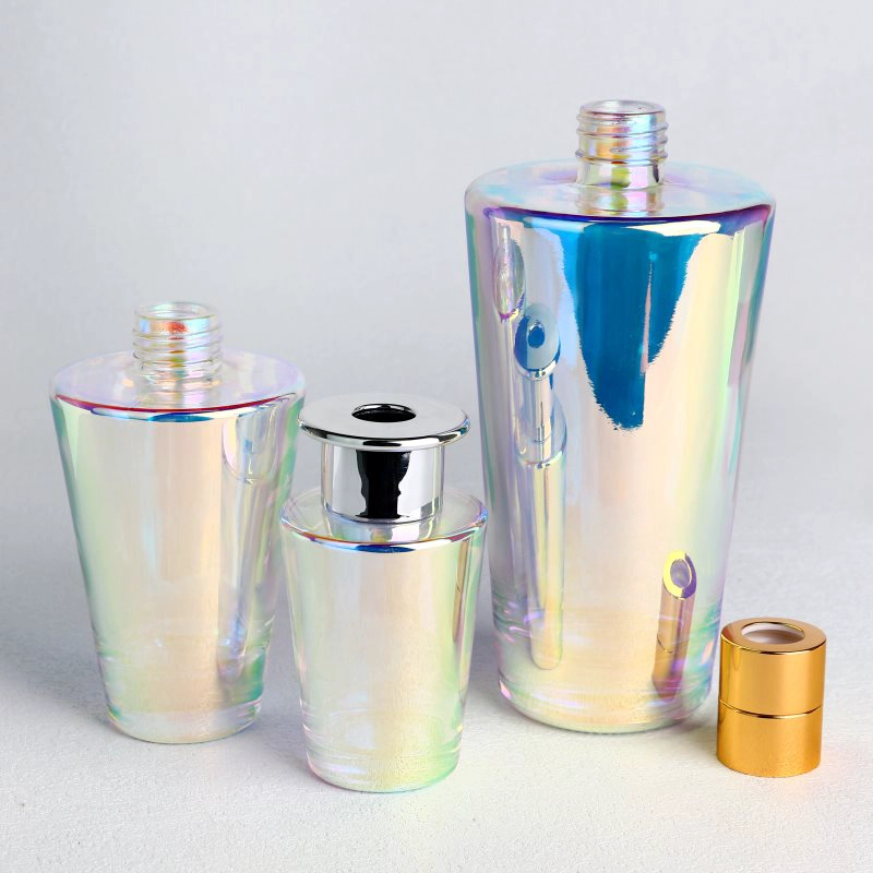 Botellas difusoras de vidrio redondo galvanizado con tapas