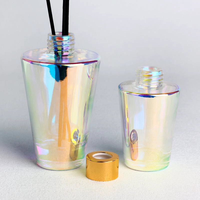 Botellas difusoras de vidrio redondo galvanizado con tapas