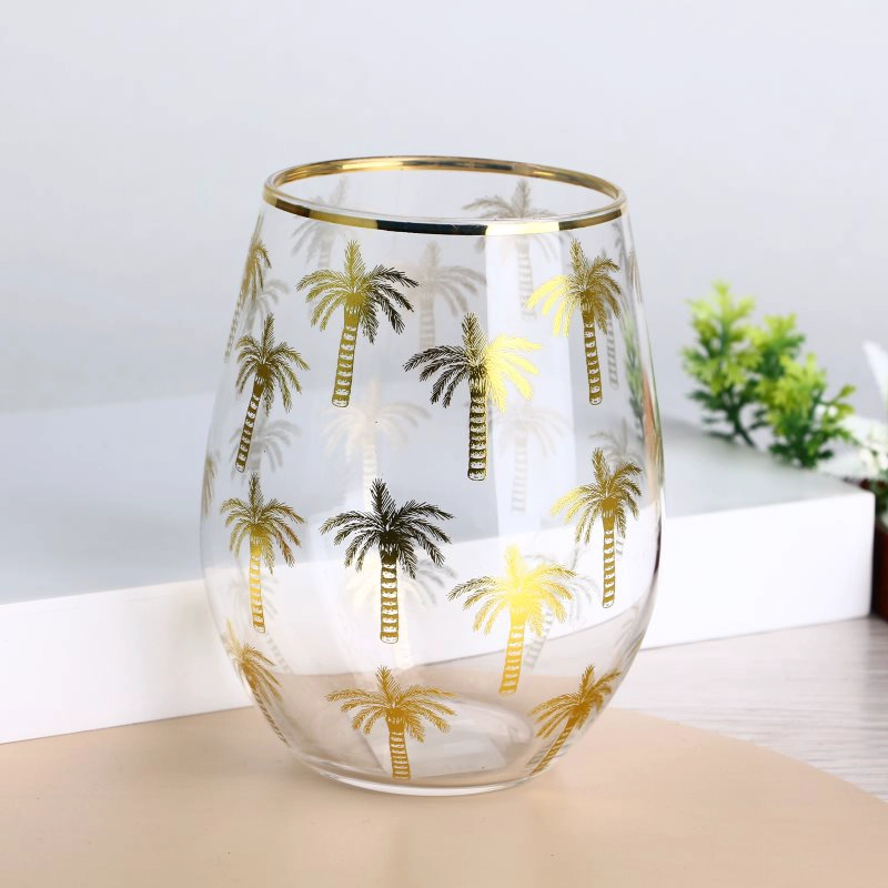 Gouden rand stengelloze wijnglas tuimelaars met palmpatroonstickers