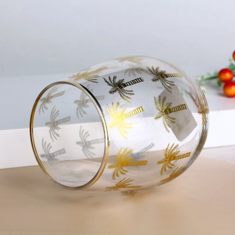 Gouden rand stengelloze wijnglas tuimelaars met palmpatroonstickers