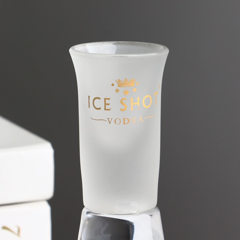 Aangepast logo geprinte wijd uitlopende getinte matig afgewerkte shotglas met zware bodem
