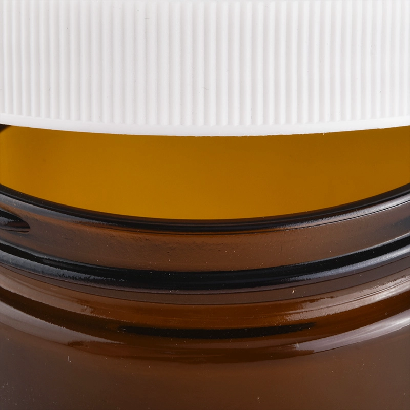 screw top glass candle jar with white lid