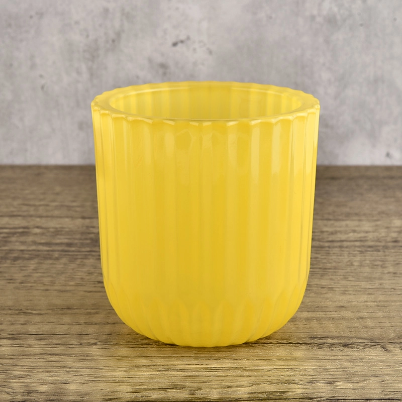 Unique shape glass candle holder with strip patterns