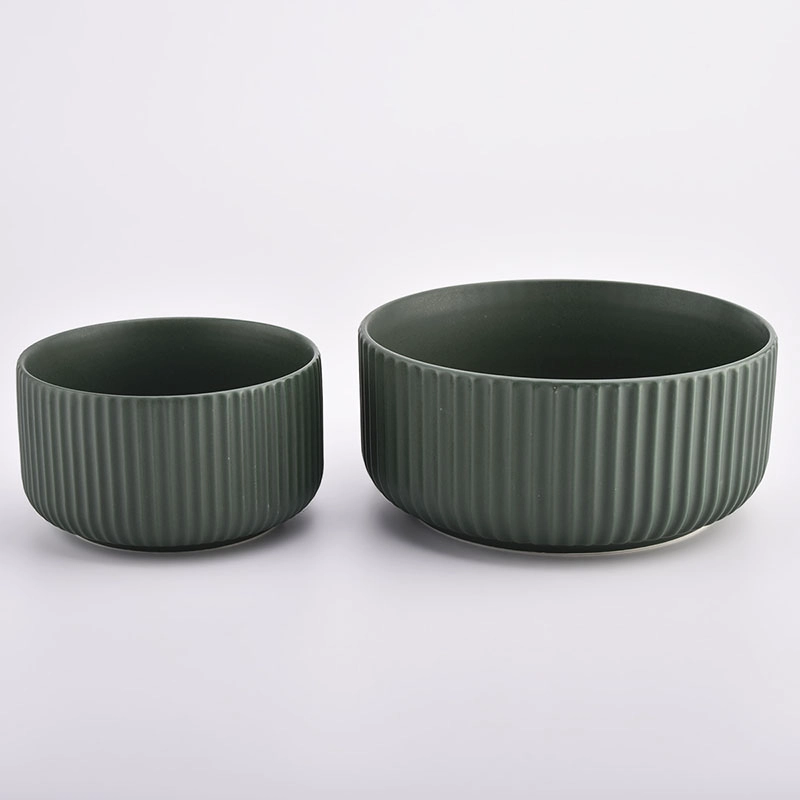 dark green ceramic candle vessels