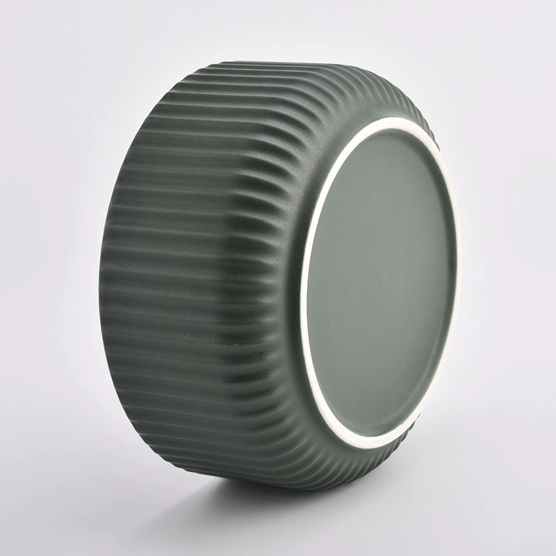 dark green ceramic candle vessels