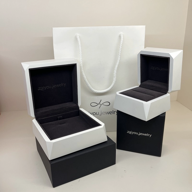 China lacquer finished irregular angle luxury elegant white wooden jewelry packaging box manufacturer