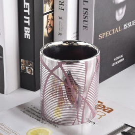 unique patterned ceramic candle container with silver inside
