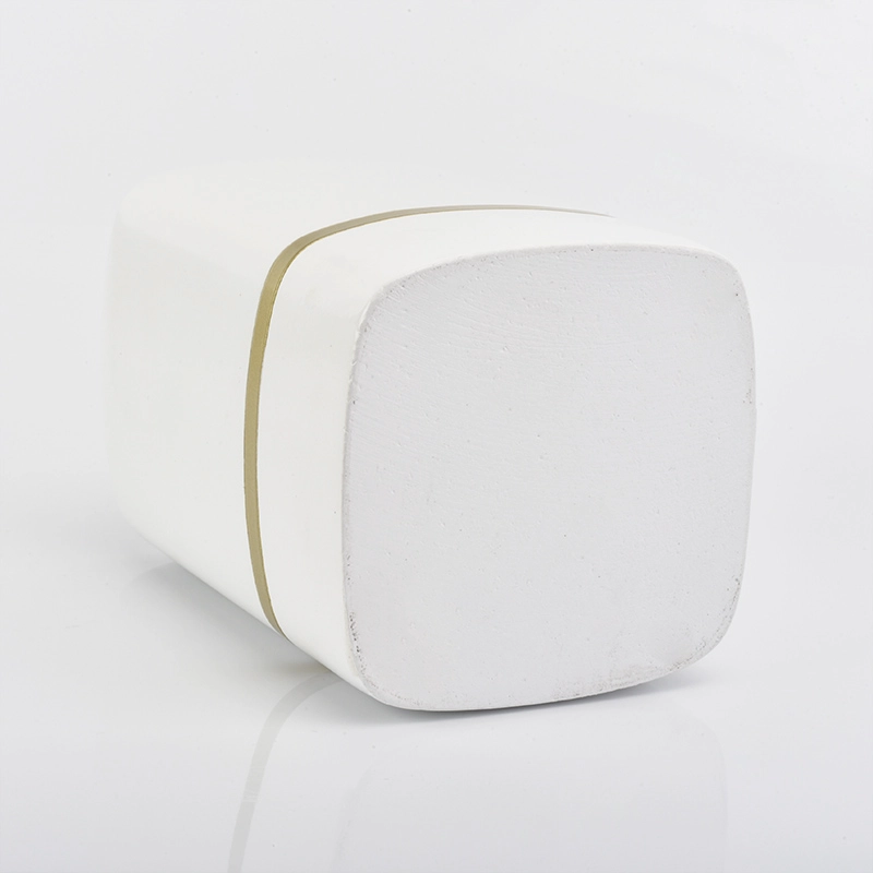 white rectangle concrete candle jars