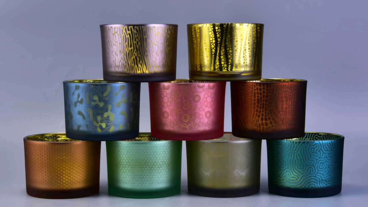 glass candle holder with different decorations