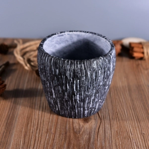Decorative empty concrete candle holder